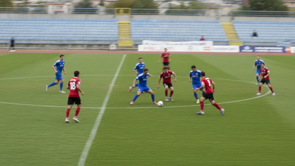 Imatge genèrica d'un partit de futbol de categories inferiors, amb jugadors lluitant per la pilota.