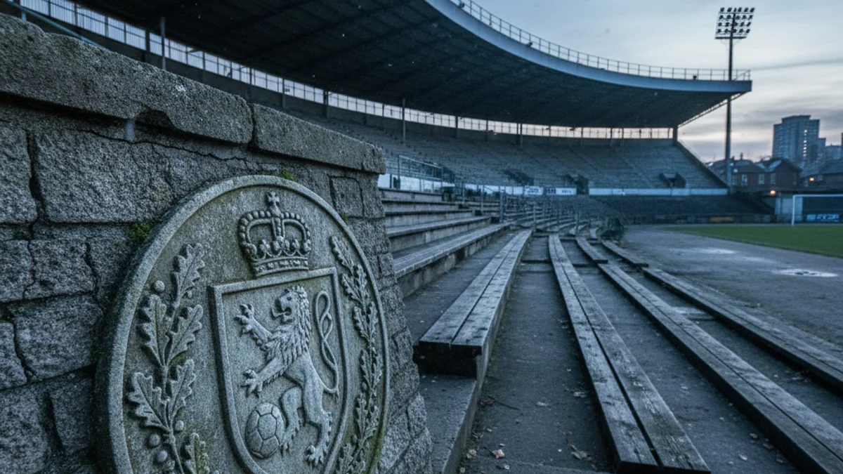 Generic image of an old football crest on a stone wall in an empty stadium.