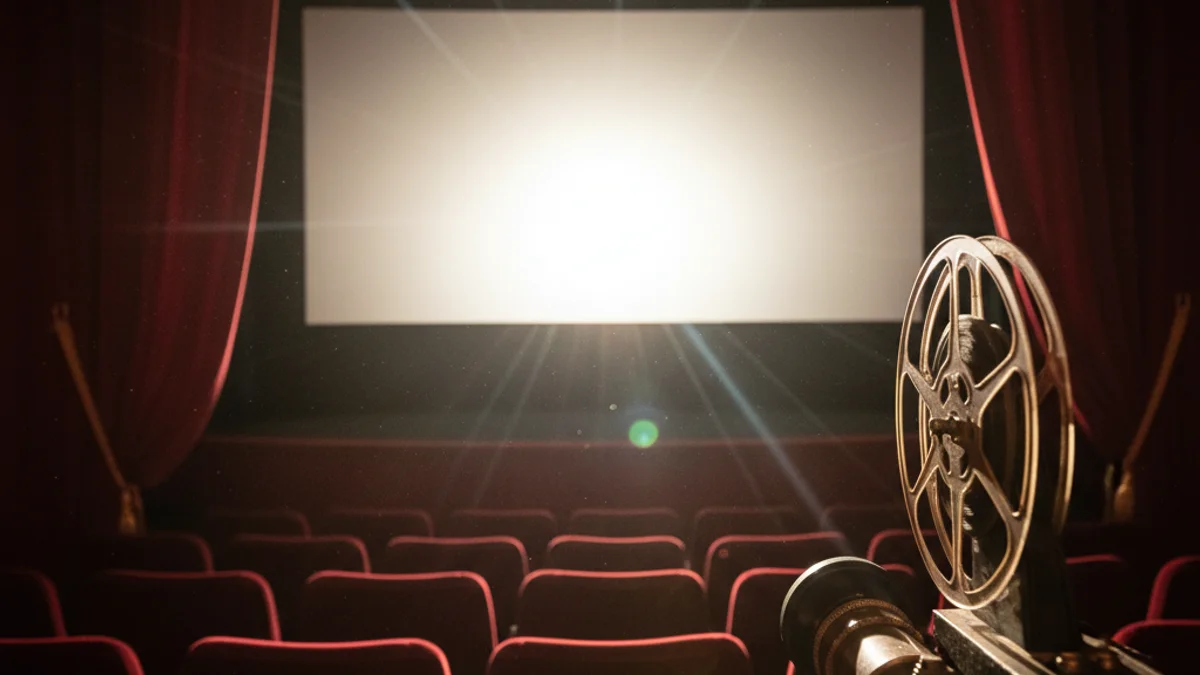 Imatge genèrica de l'interior d'una sala de cinema amb la pantalla il·luminada.