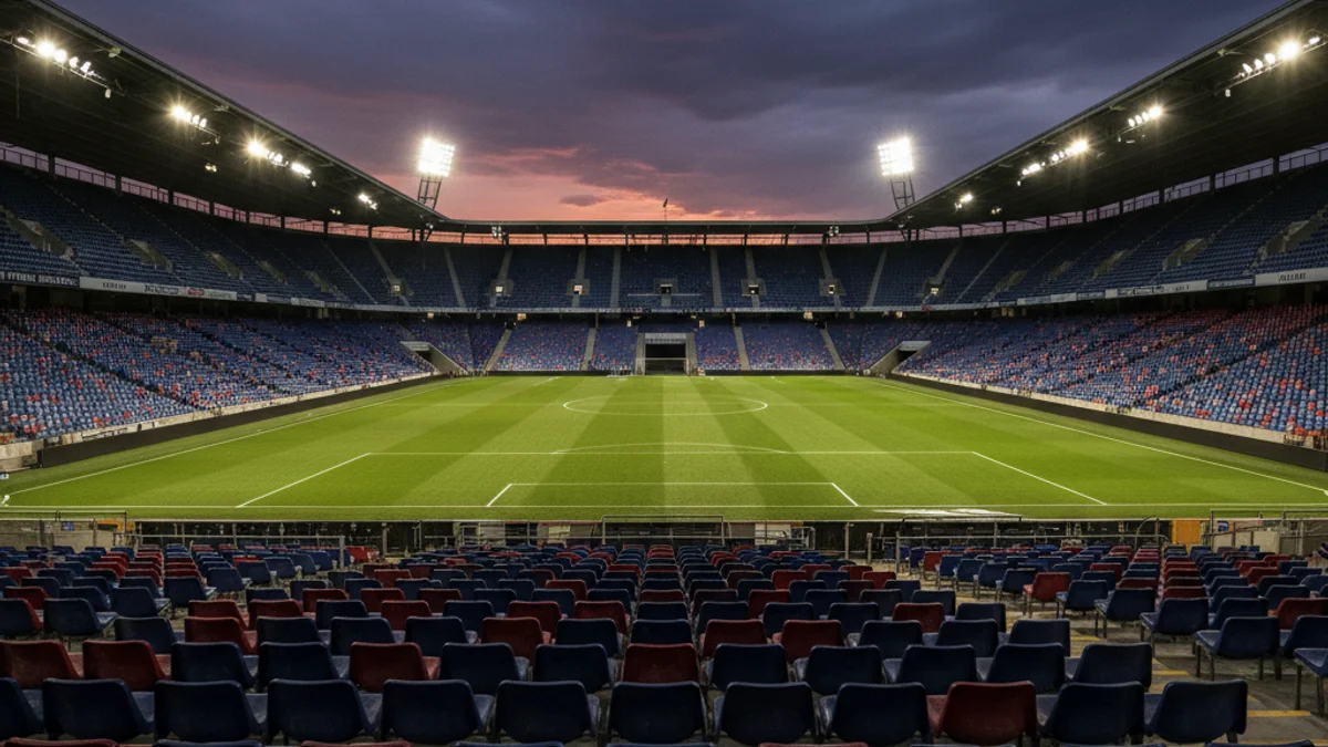Imatge genèrica d'un estadi de futbol buit sota els focus, simbolitzant la situació del club.