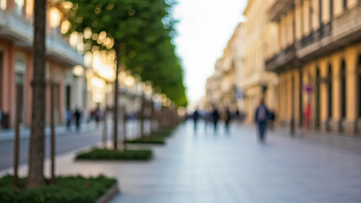 Imatge d'una zona urbana pacificada amb voreres amples i arbrat