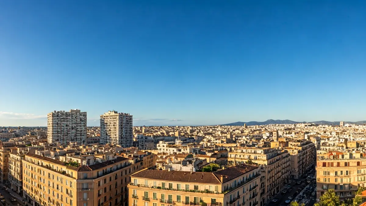 Generic image of a clear, sunny sky over a Mediterranean city.
