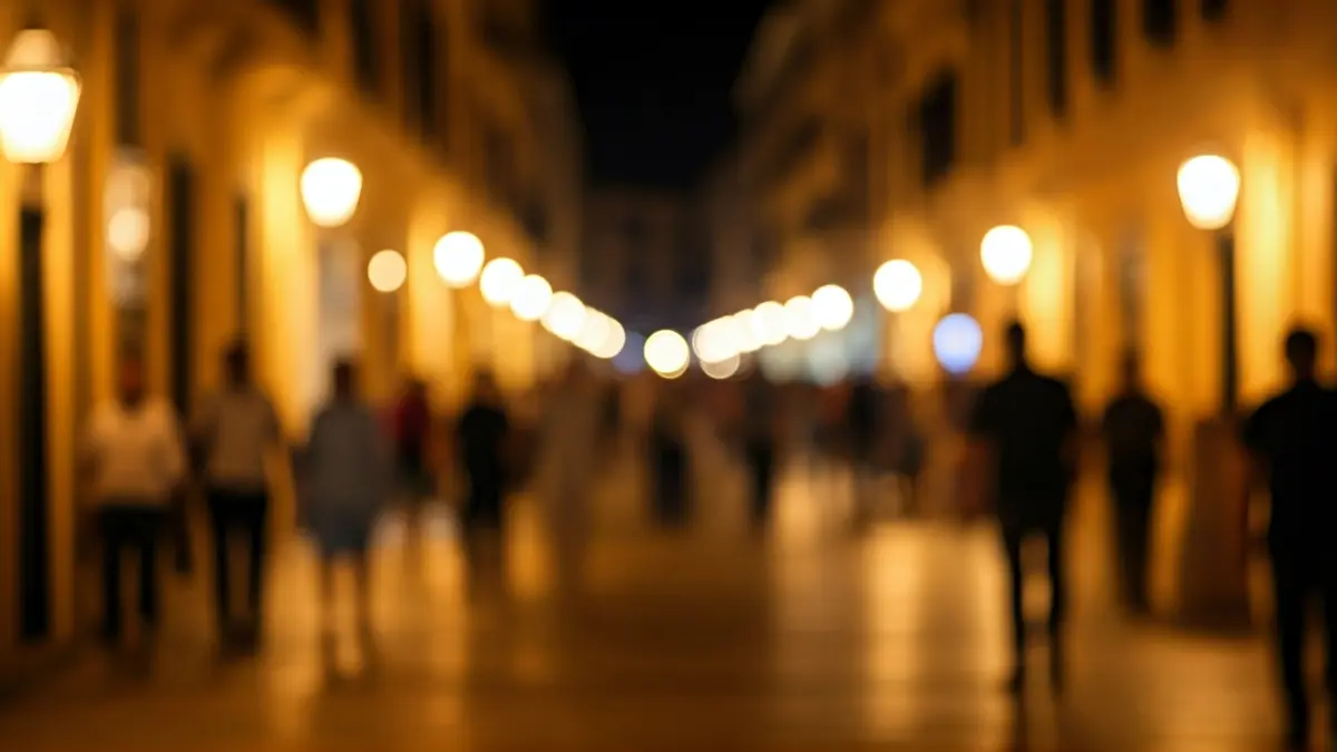 Generic image of a blurred nocturnal urban scene with soft lights.