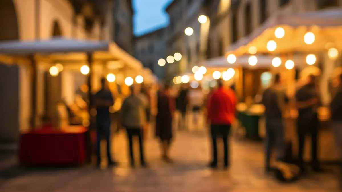 Imatge genèrica d'un mercat medieval amb parades d'artesania i gent.