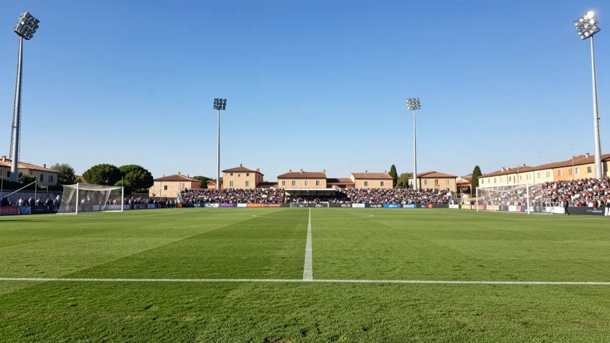 Imatge genèrica d'un camp de futbol amb llums d'estadi.