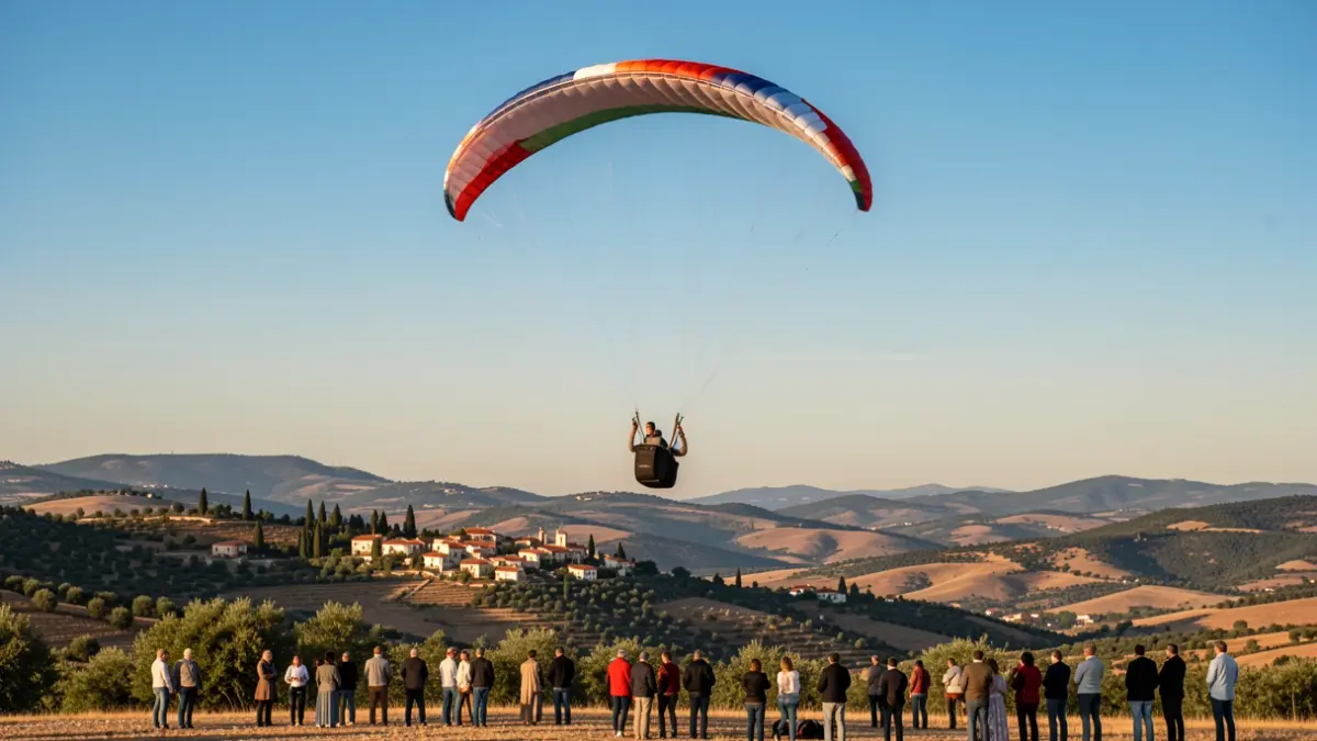 Generic image of a paraglider flying over a Mediterranean landscape.