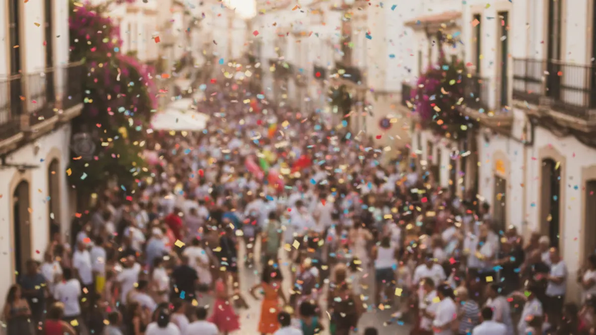 Imagen genérica de una fiesta popular con gente y confeti.