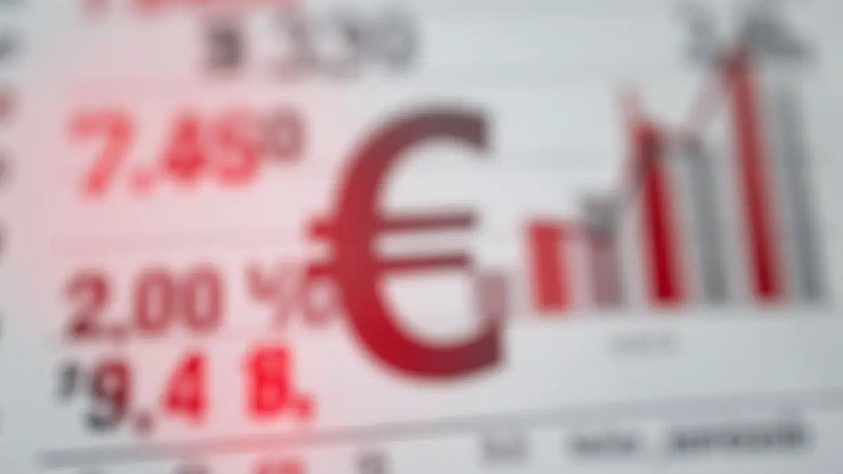 Abstract representation of financial debt with blurred numbers and graphs.
