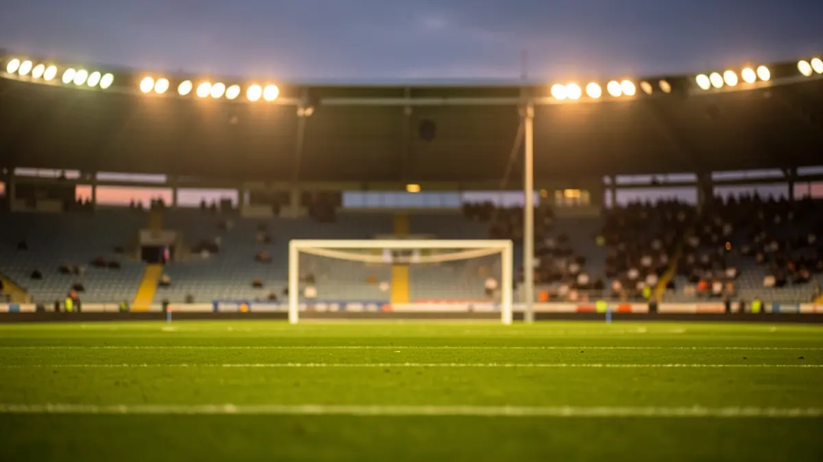 Imagen genérica de un estadio de fútbol iluminado al atardecer.