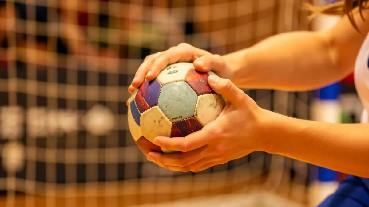 Generic image of a handball in a player's hands.