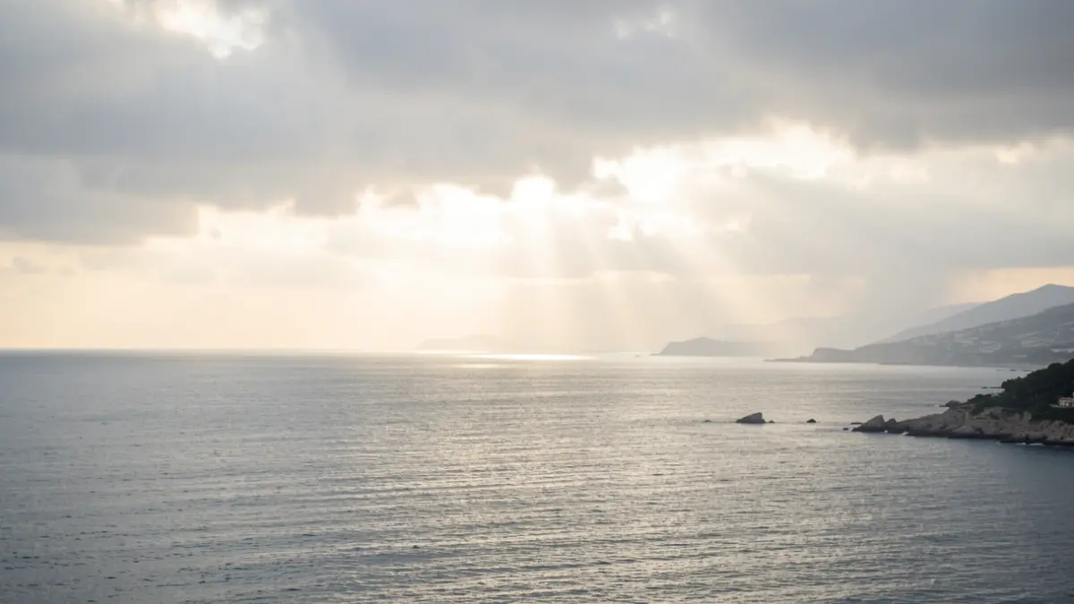 Cloudy sky over the Tarragona coast with breaking sun.