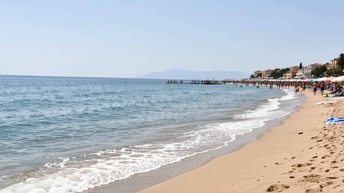 Generic image of a calm Mediterranean beach with sun.