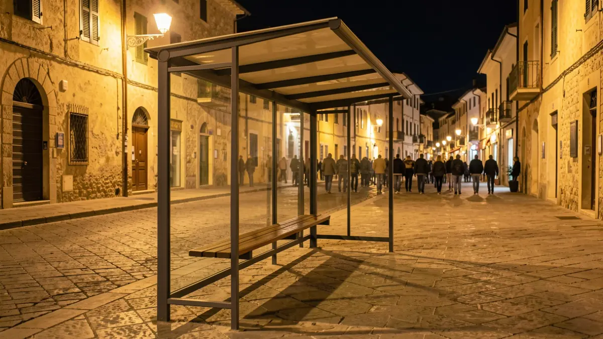 Generic image of an urban bus stop at night.
