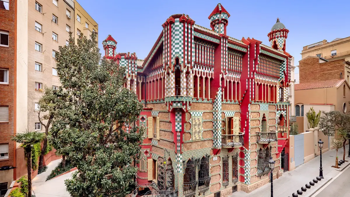 Facade of Casa Vicens, designed by Antoni Gaudí in the Gràcia district, with its green and white chequered tiles.