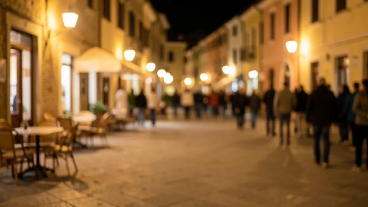 Generic image of a Mediterranean town square at night.