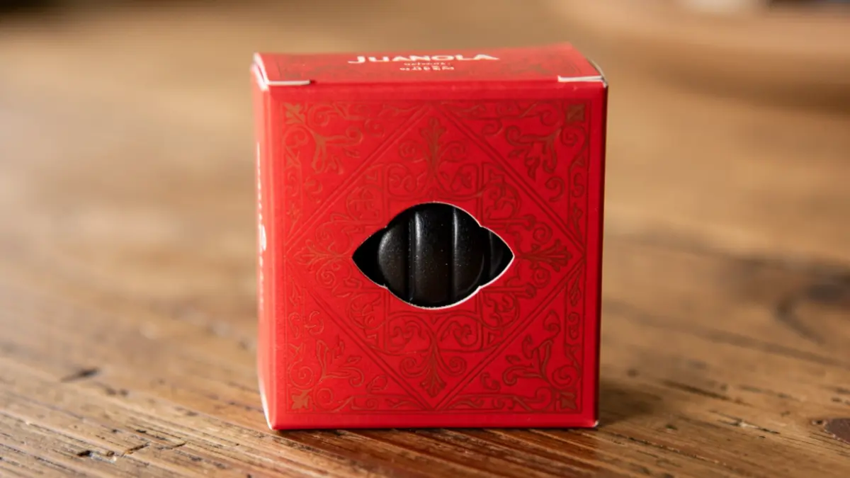 Juanola candy box with a traditional design.
