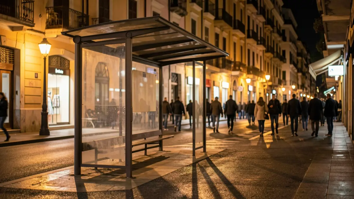Generic image of an empty bus stop at night.